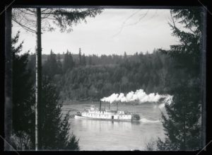 Photograph, view of a boat on the Willamette River in front of the Finley house, taken from study window (Dec. 1907)